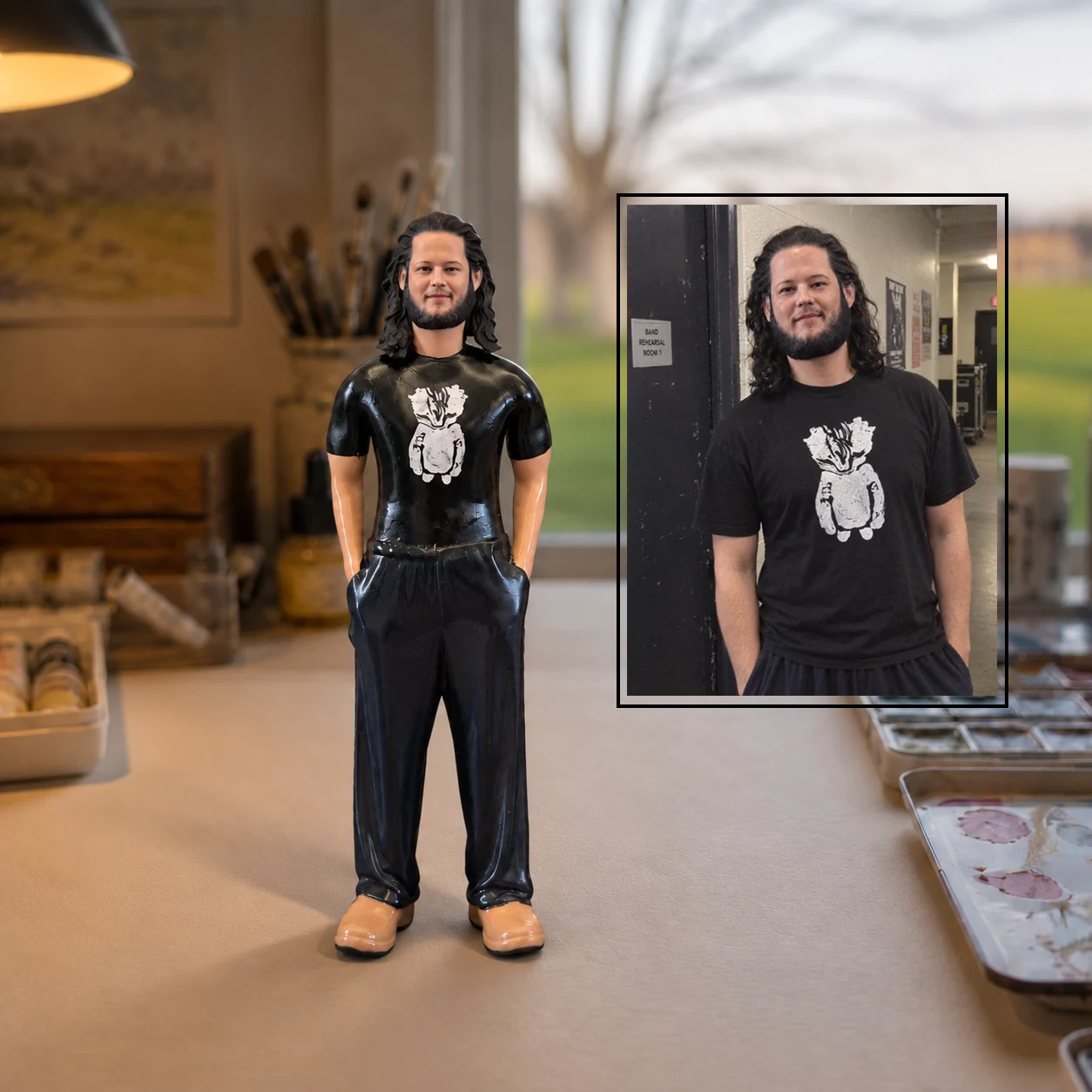 Black T-shirt portrait figurine with its reference photo in a supplied comparison composition